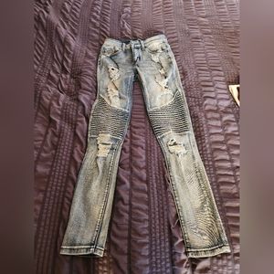 Stretching fashion jeans.